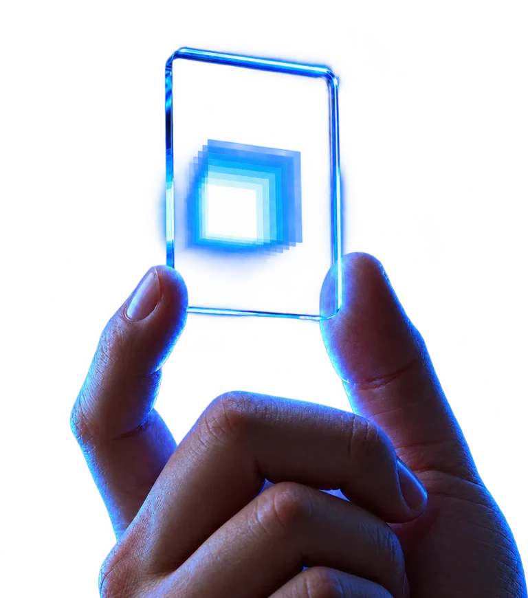 Hand holding a glowing, transparent glass chip with a bright blue rectangular visual effect, tagged with dhumi.